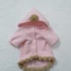 Cappottino rosa con pom pom